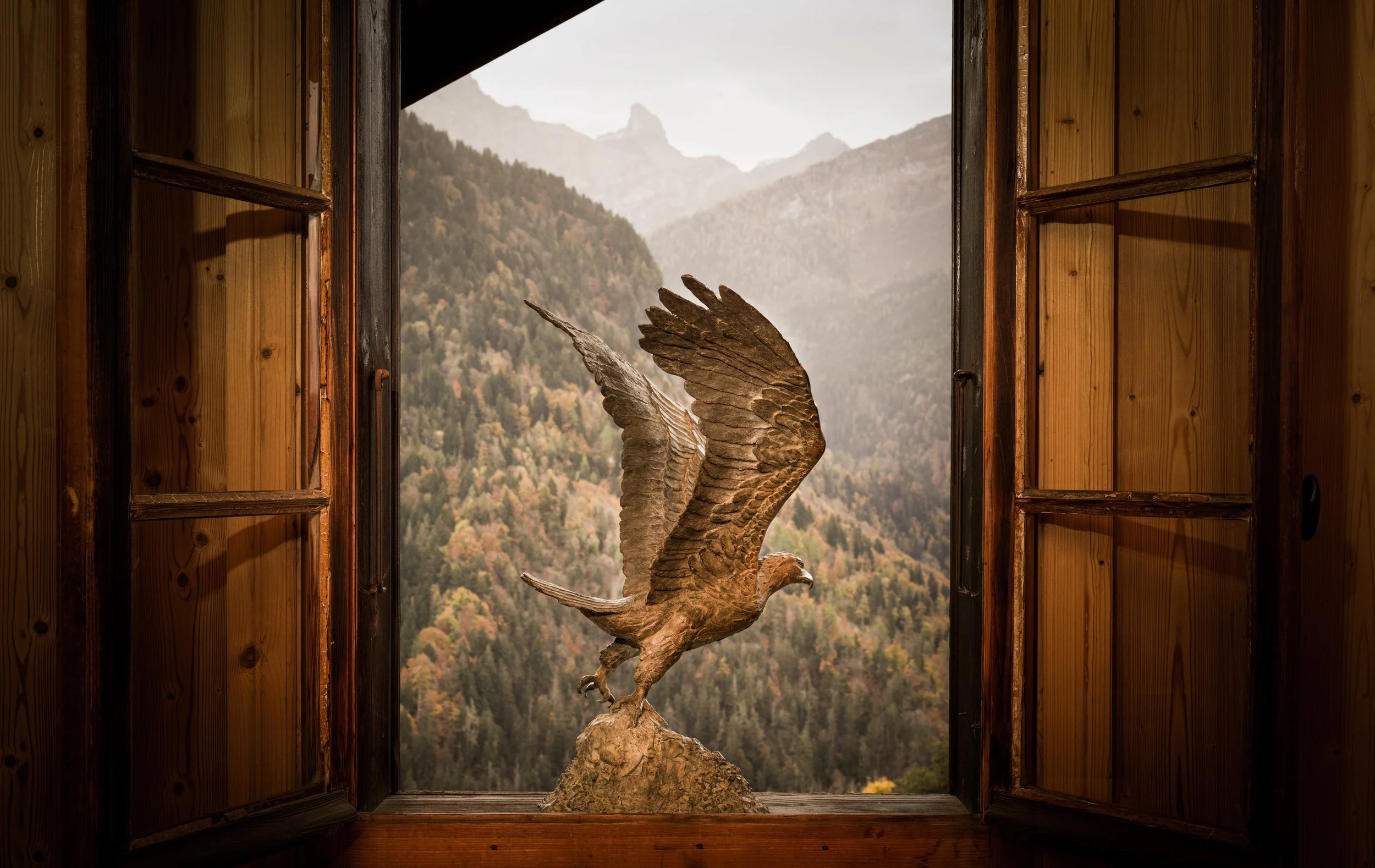 Golden Eagle in bronze in a chalet copy.jpeg