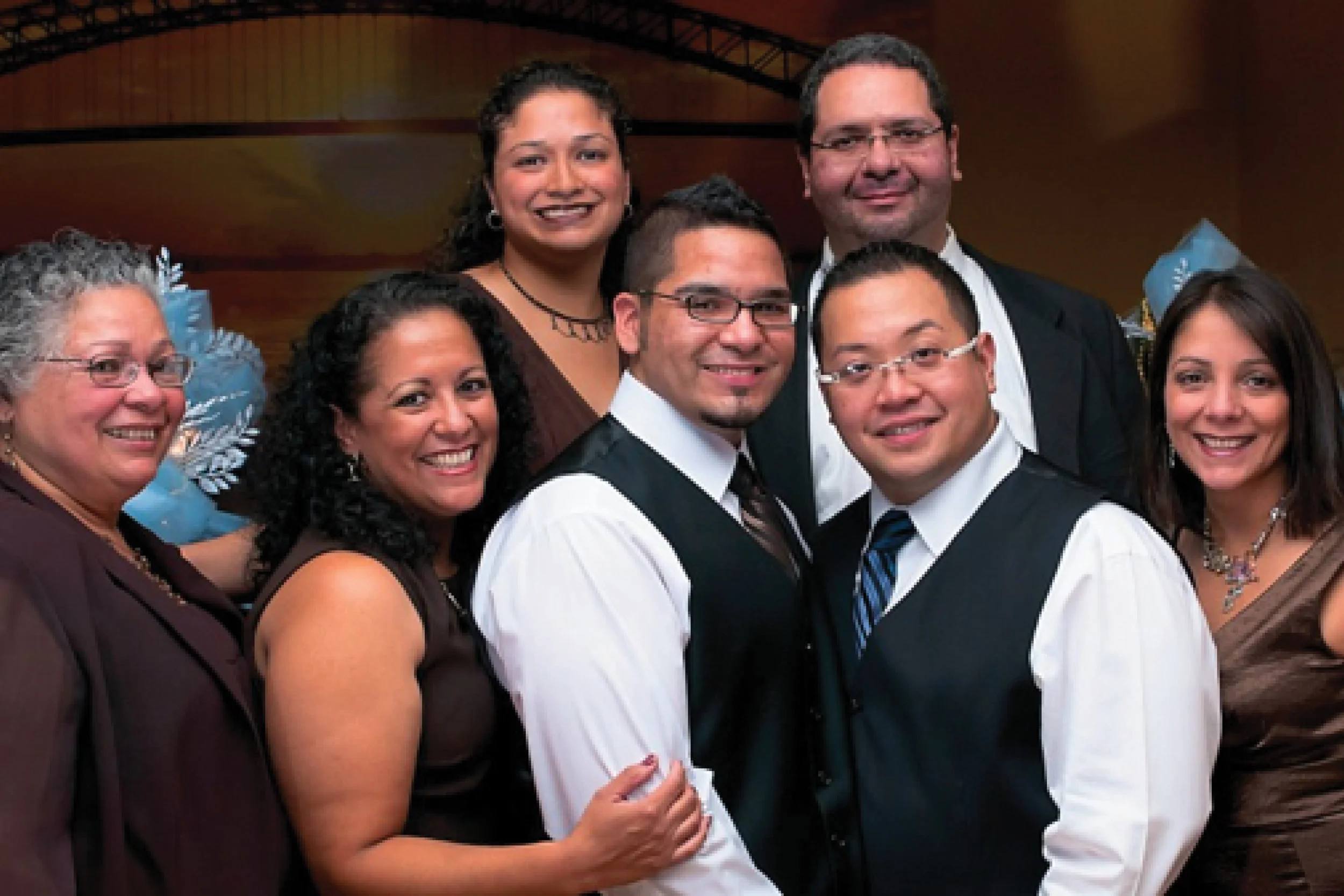 David and Neil’s wedding day with Davi'd’s mother, brother, and three sisters.