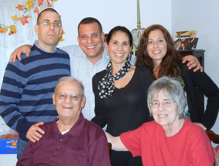 Raymond with family.jpg