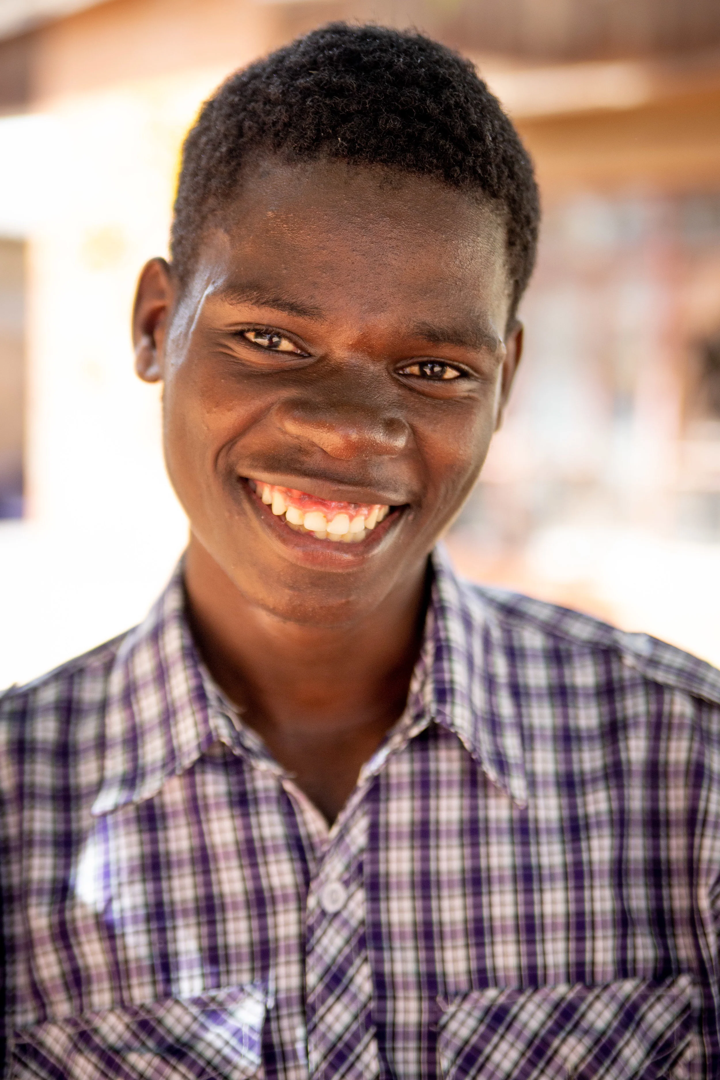 Alexandre’s family has provided a college scholarship for Peter who is studying at the Kafue Institute of Health Sciences.