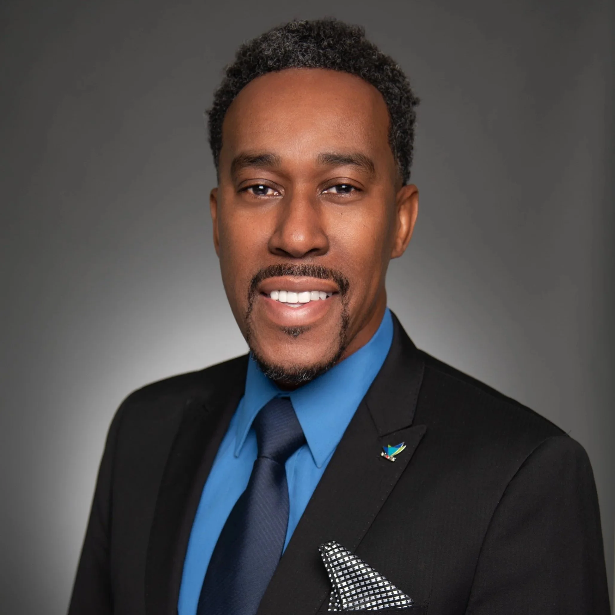 William Wesley, Treasurer of the Inspiredu Executive Board and Senior Community Development Representative at Delta Community Credit Union.
