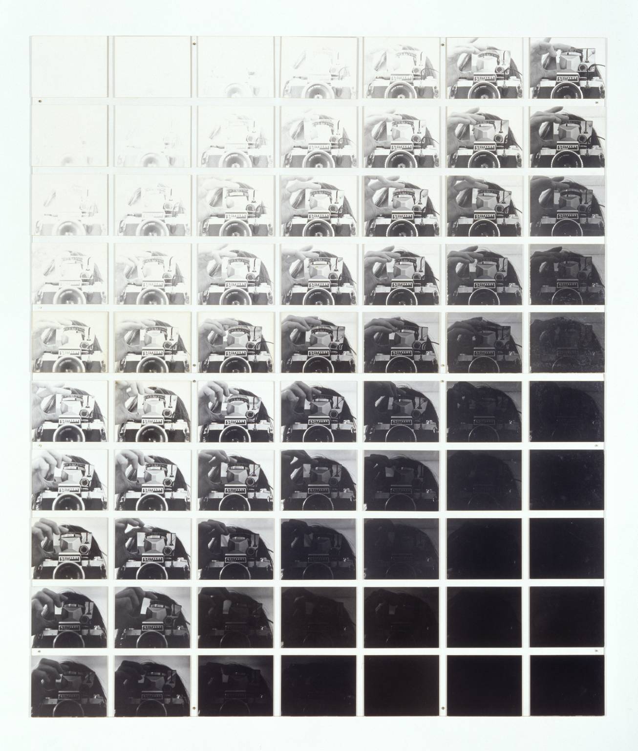 John Hilliard Camera Recording its Own Condition (7 Apertures, 10 Speeds, 2 Mirrors) 1971 Photographs on card on perspex image: 2162 x 1832 mm Presented by Colin St John Wilson 1980© John Hilliard