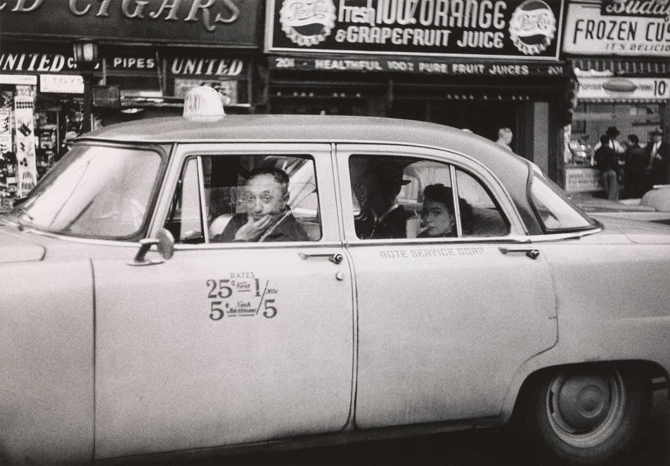 ‘Taxicab driver at the wheel with two passengers, N.Y.C.’ (1956) © The Estate of Diane Arbus, LLC. All Rights Reserved
