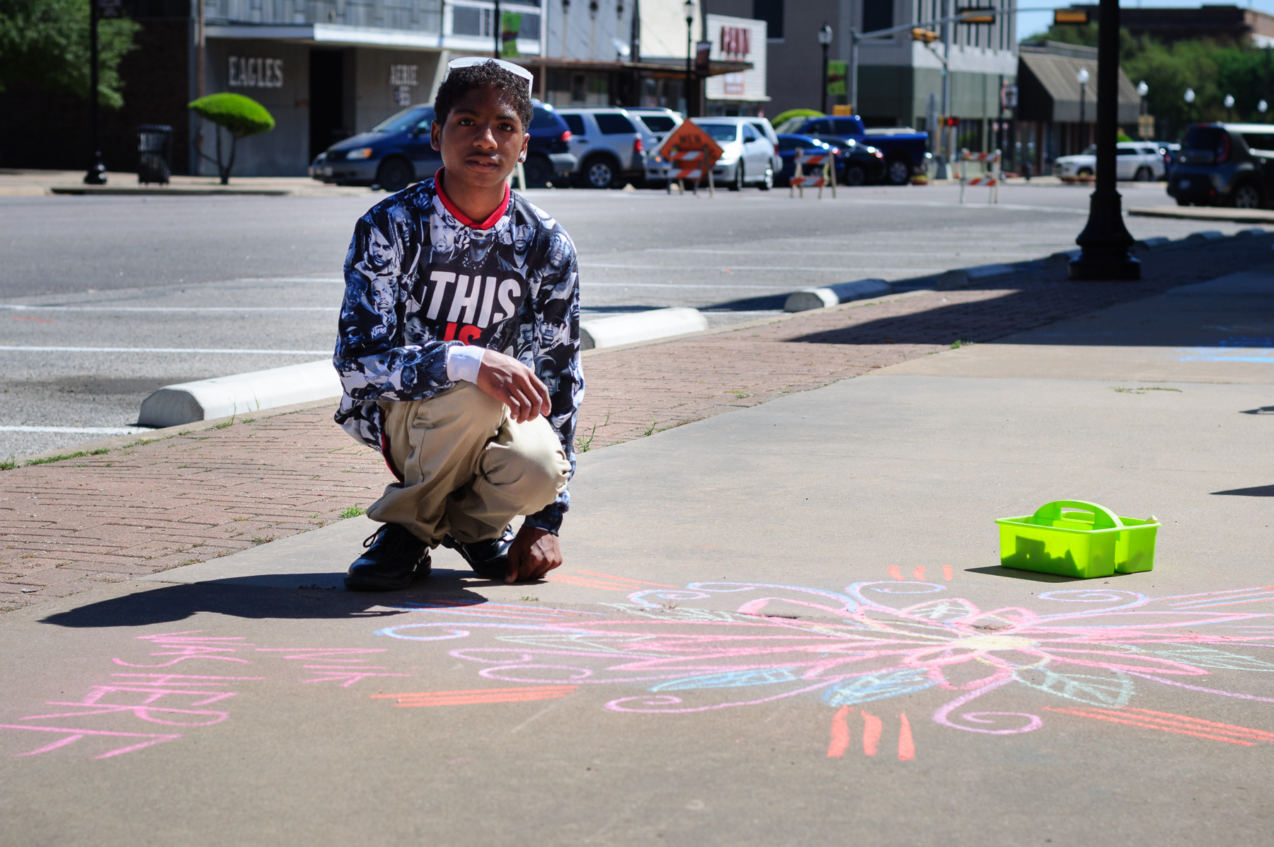 NIK WAS HERE... this young man spent some time making his mark on the sidewalk of Main Street.