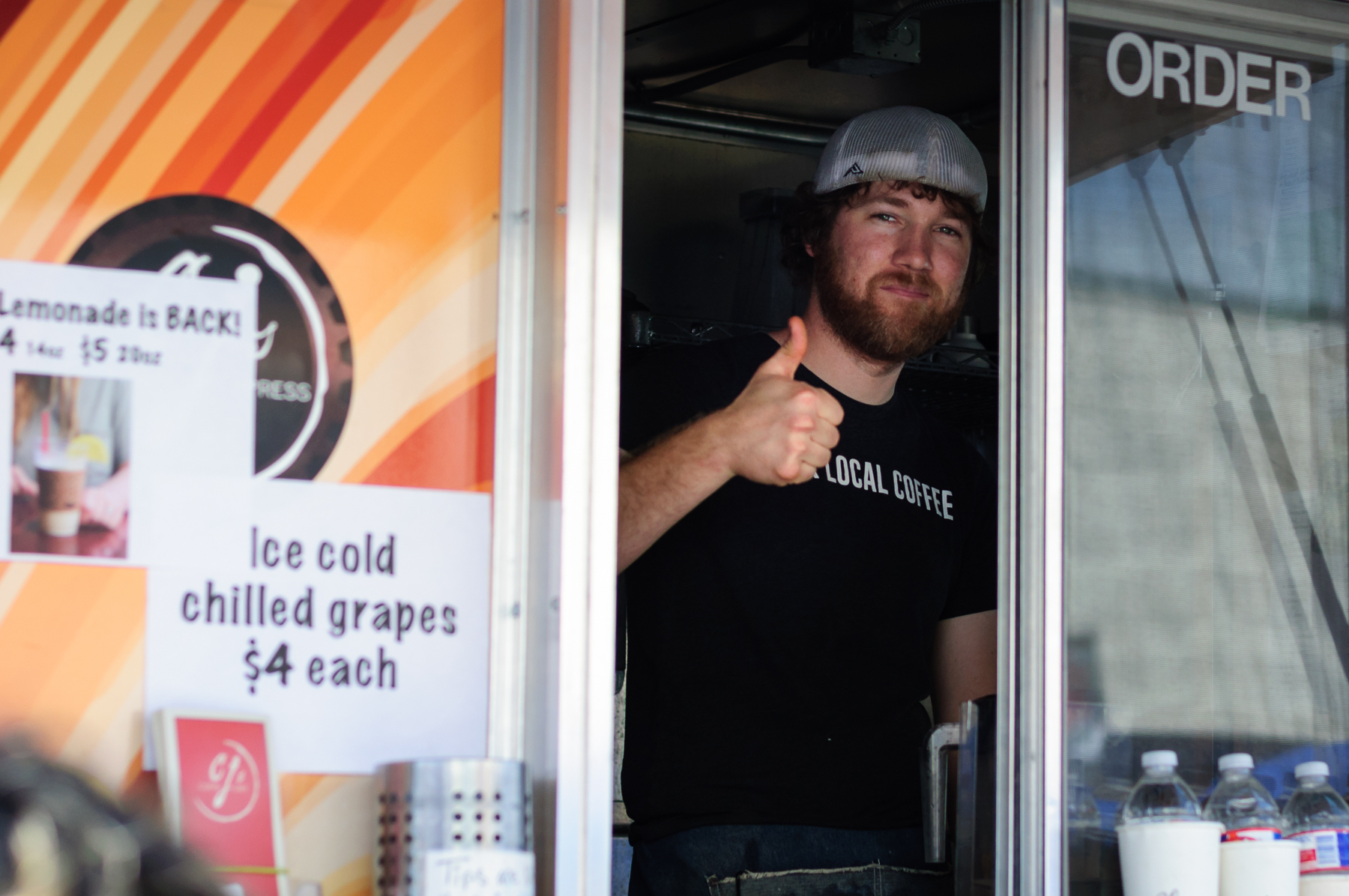 CJ's Jonathon Gentry giving the thumbs up. What for? Coffee, that's what for.