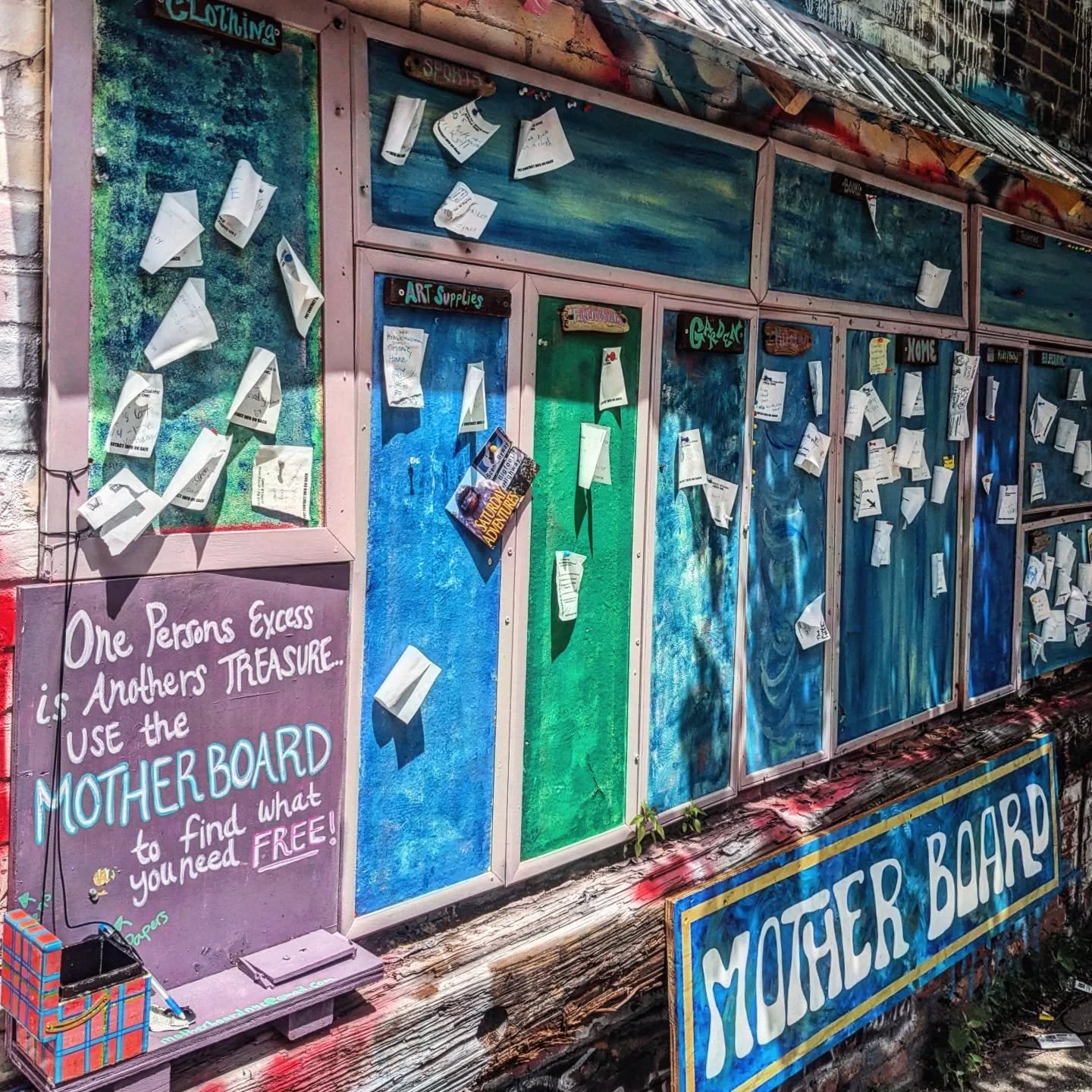 Yesterday I found this amazing art/community project in my neighborhood called the Mother Board. It's a bulletin board with paper, pens, and pins for free resources and ISO asks.

Some of the notes are practical: I need a lamp, does anyone have an ol