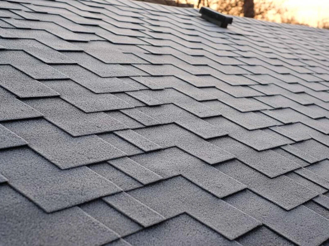 Asphalt Versus Metal Roofs