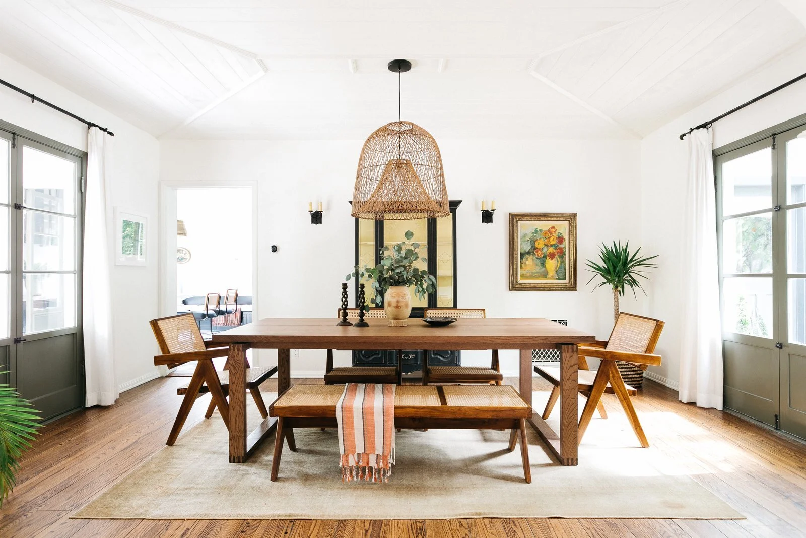 measuring-2957-square-feet-the-main-dwelling-flows-between-several-living-spaces-the-dining-area-sits-sandwiched-between-the-living-room-and-kitchen.jpg