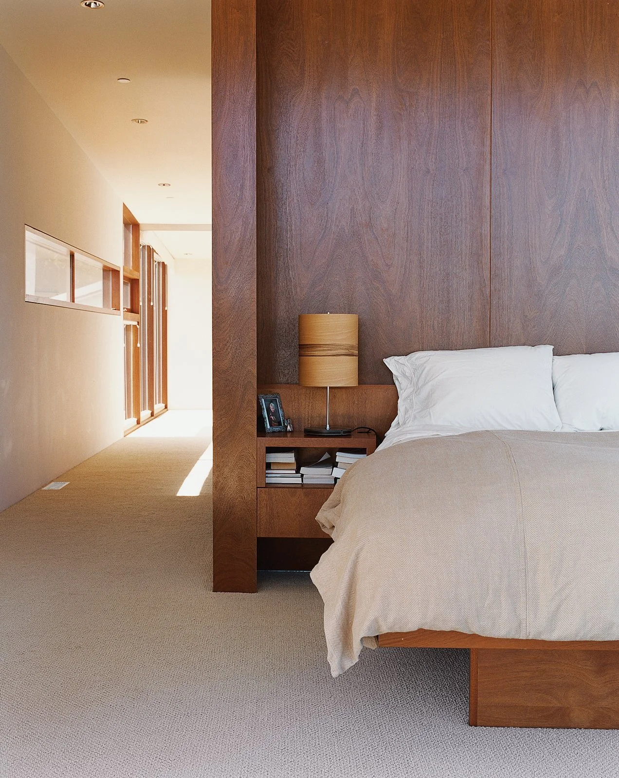 the-master-bedroom-interior-is-finished-with-cherry-wood.jpg