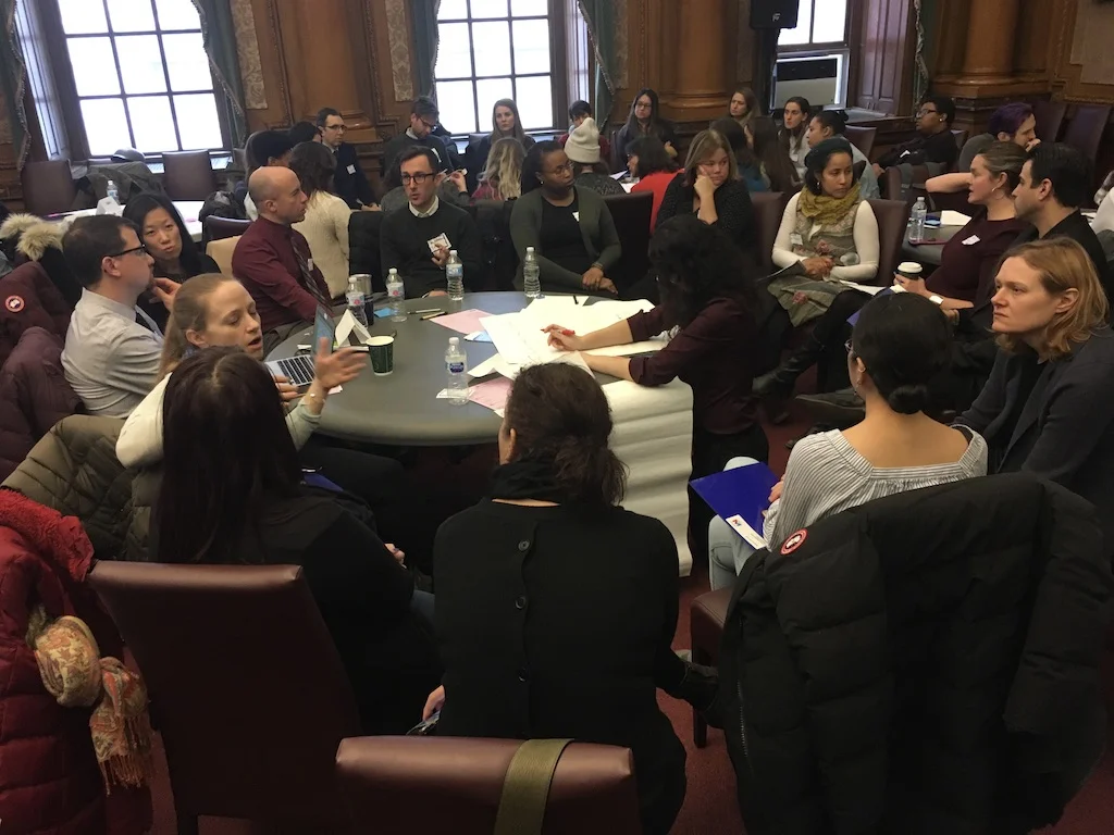 MC School Leaders huddle at the Winter Q to talk about race & mastery.