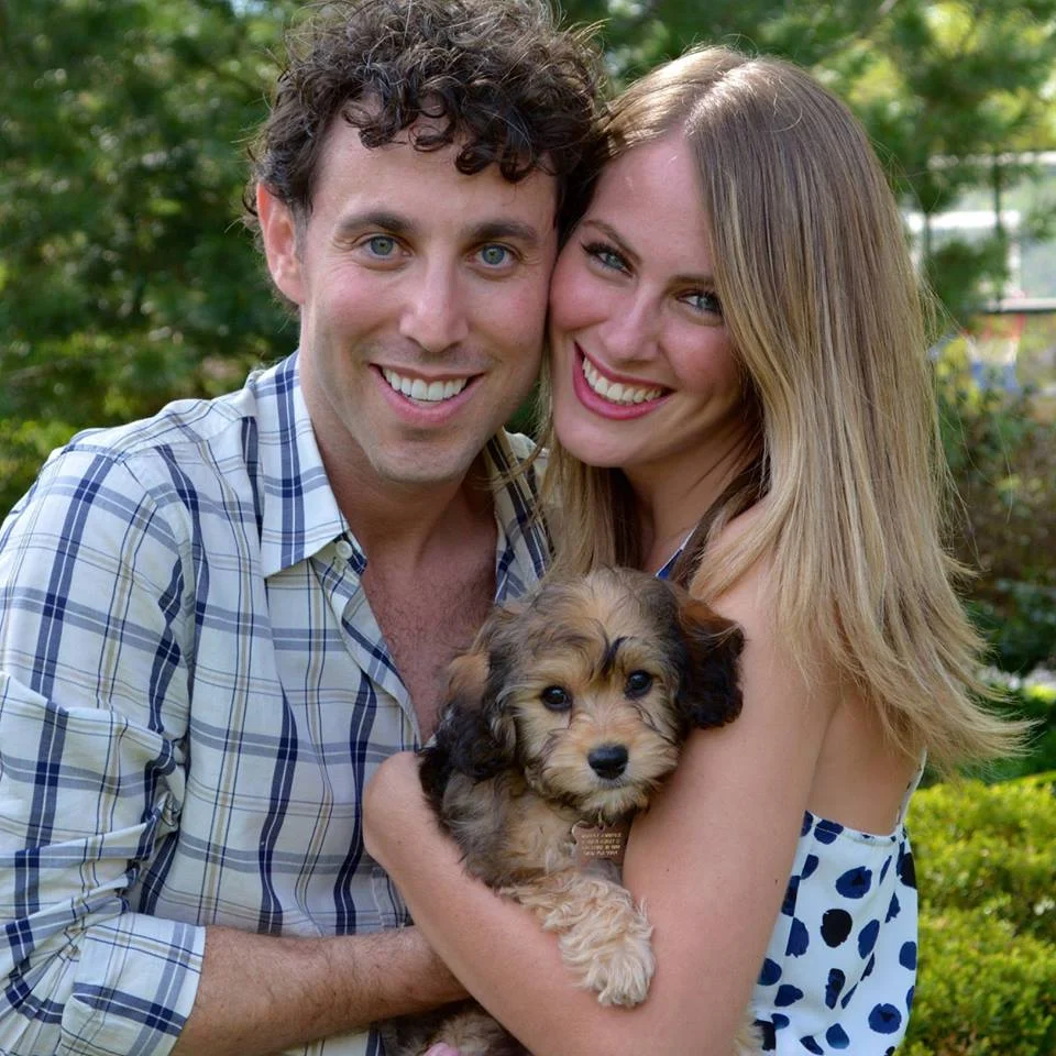 What a gorgeous couple! (And a totally adorable Cavachon puppy too!)
