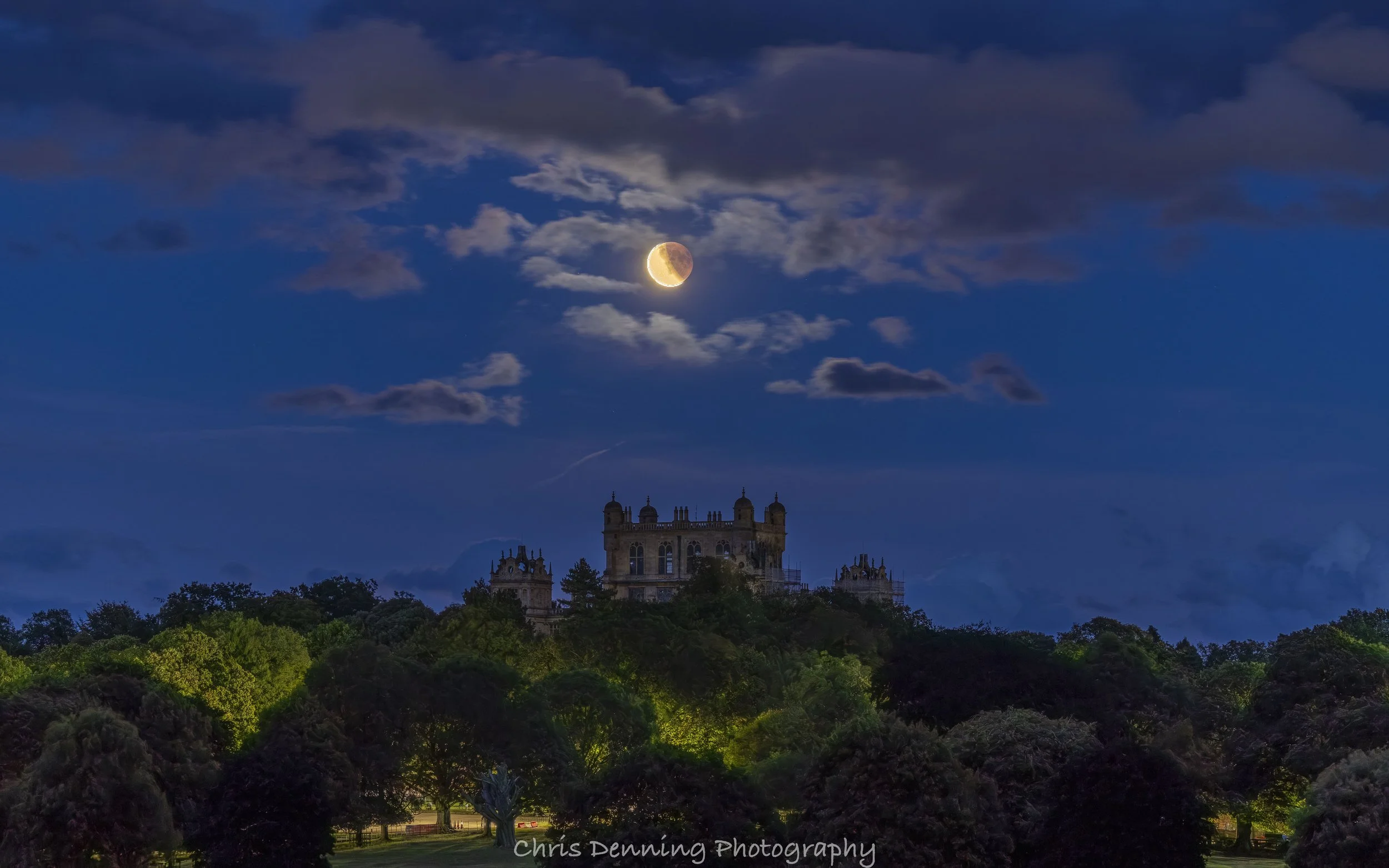 2025-1327 Partial lunar eclipse over Wollaton Hall