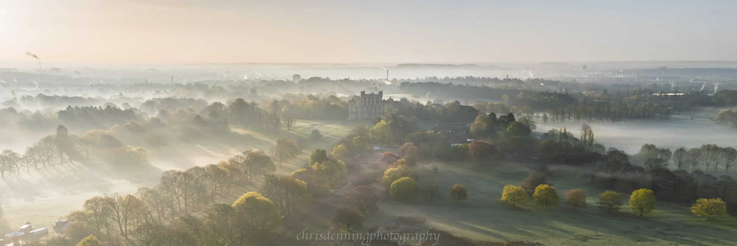 2026-0387 Aerial view of Wollaton Hall in mist, Nottingham