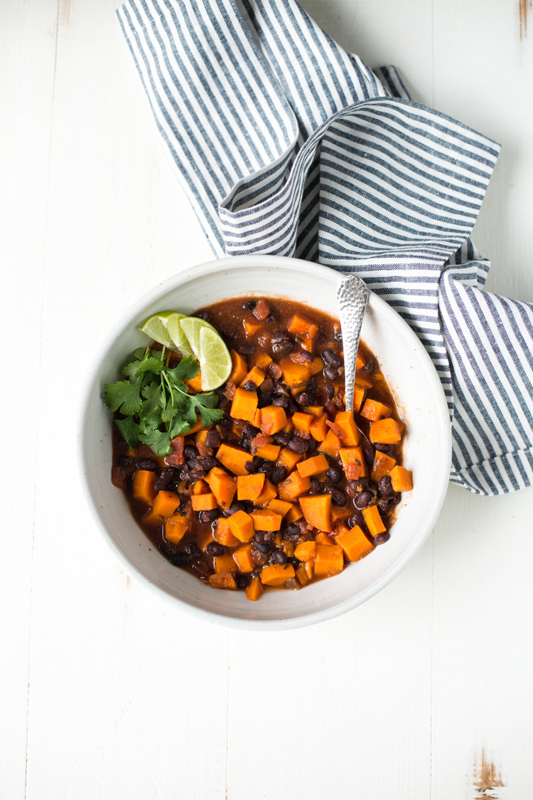 5-Ingredient Black Bean & Sweet Potato Chili is simple to prepare, totally nourishing, and absolutely delicious. Just throw a few ingredients it in the slow cooker or pressure cooker, and dinner is ready! #realfoodwholelife #realfoodwholeliferecipe #glutenfree #glutenfreerecipe #dairyfree #dairyfreerecipe #healthy #healthyrecipe #easyrecipe #quickrecipe #cleaneating #slowcooker #crockpot #instantpot