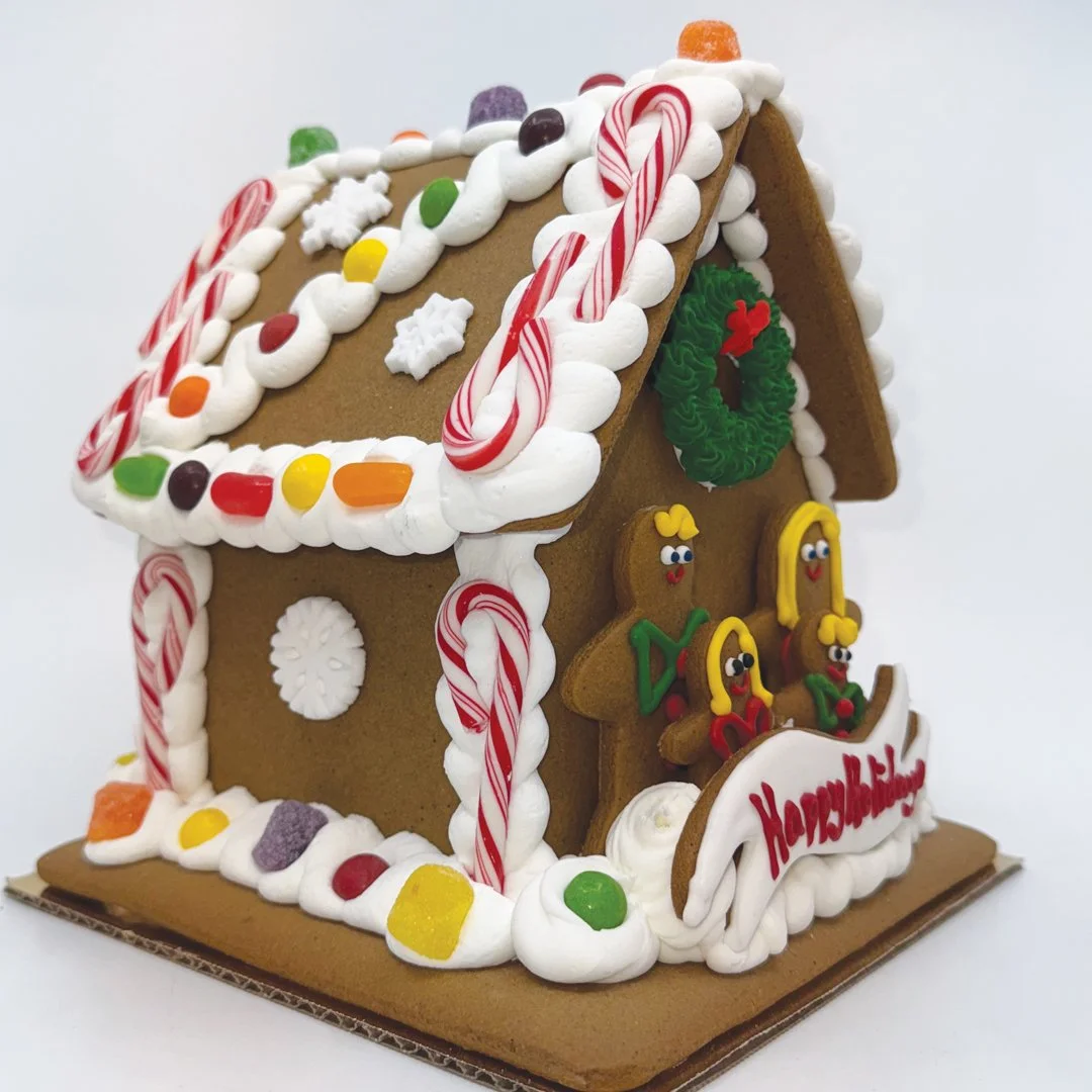 7.5" Gingerbread House with blonde hair/blue eyes and personalized banner. (Copy)