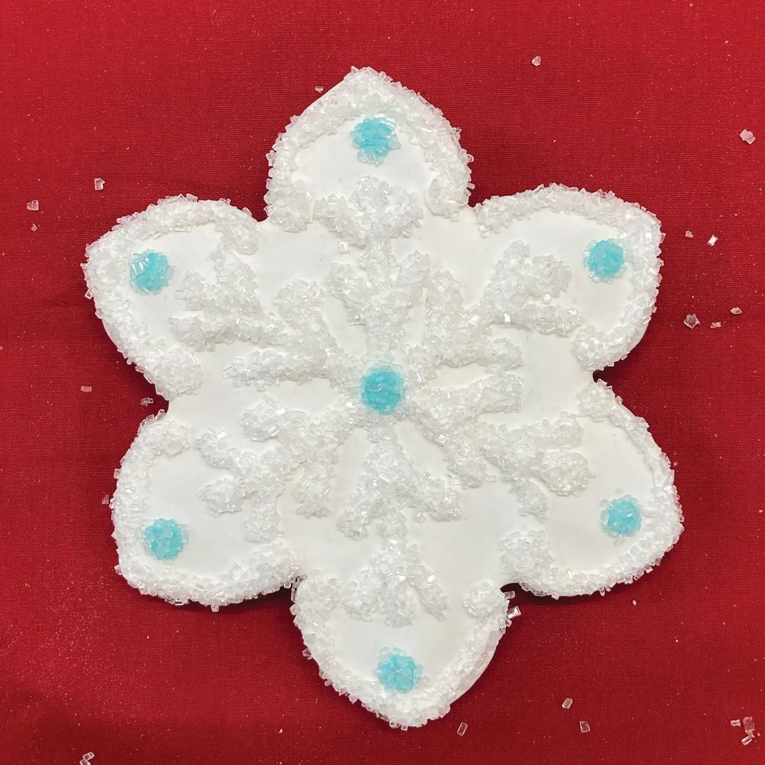 Snowflake cookie with teal accents - Gingerbread Factory