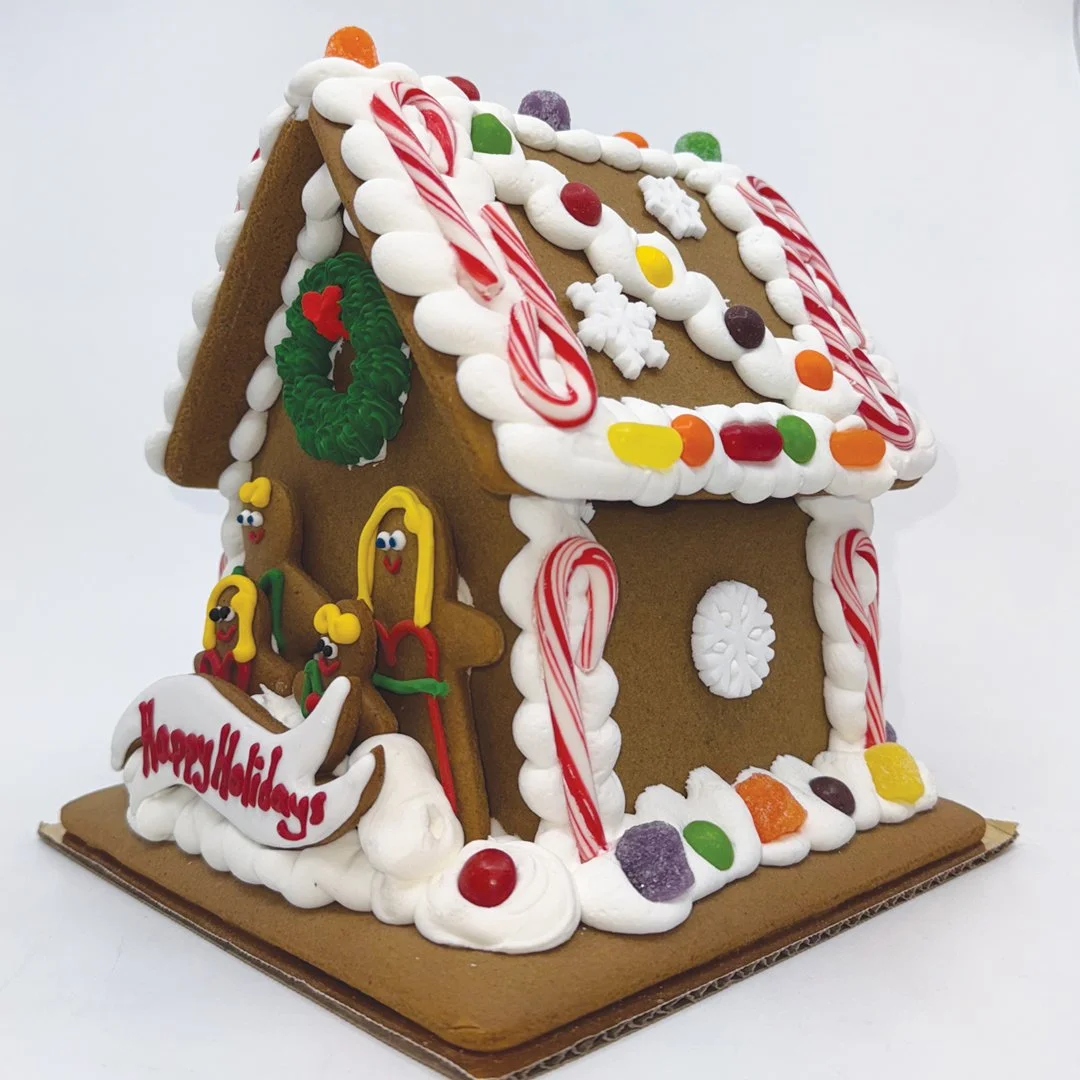 7.5" Gingerbread House with blonde hair/blue eyes and customizable banner. (Copy)