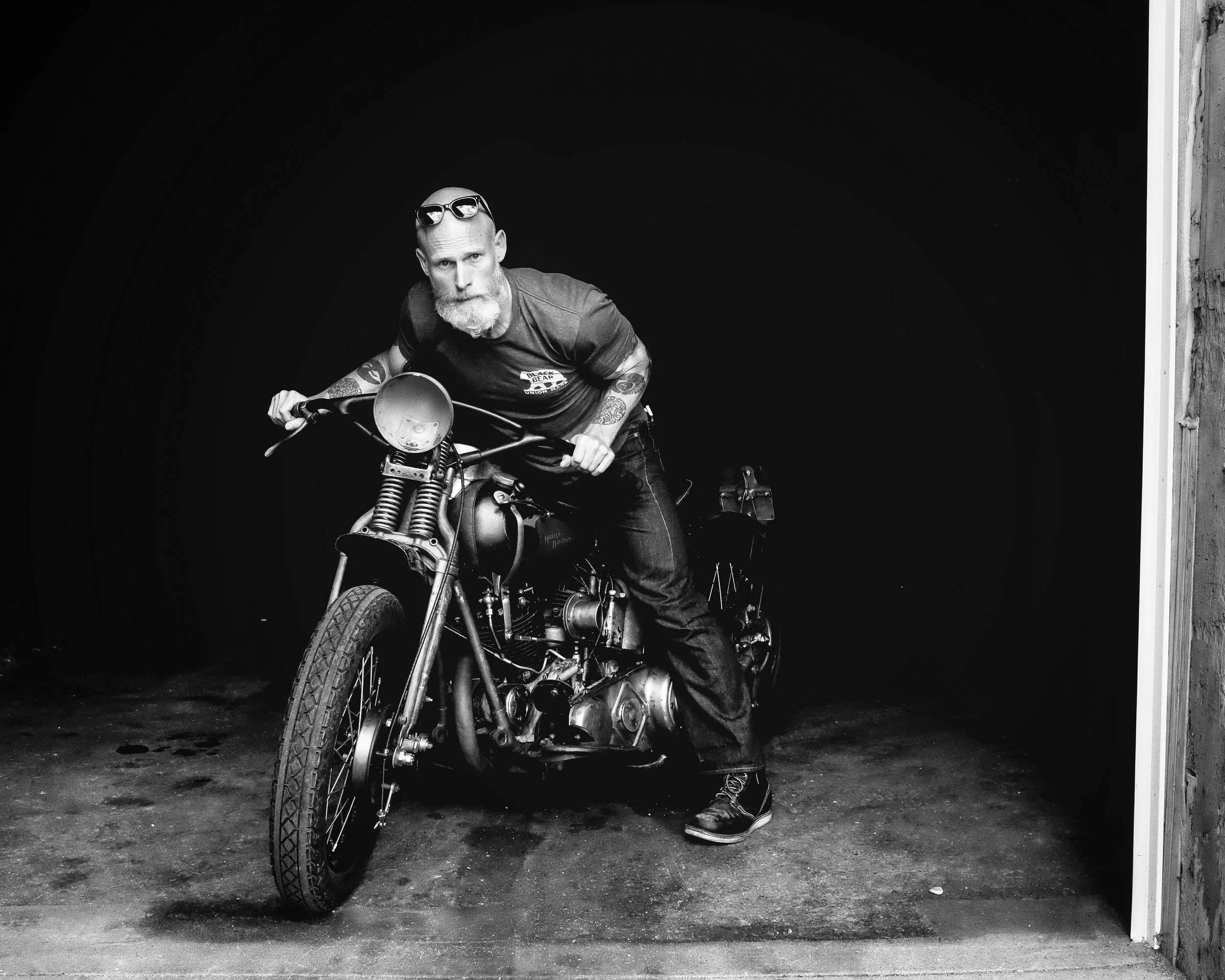 Testing the bike after working on it in the industrial district to Milwaukee as we atop to ride the vintage Harley Davidson across America. Photo by: Chad Lyons