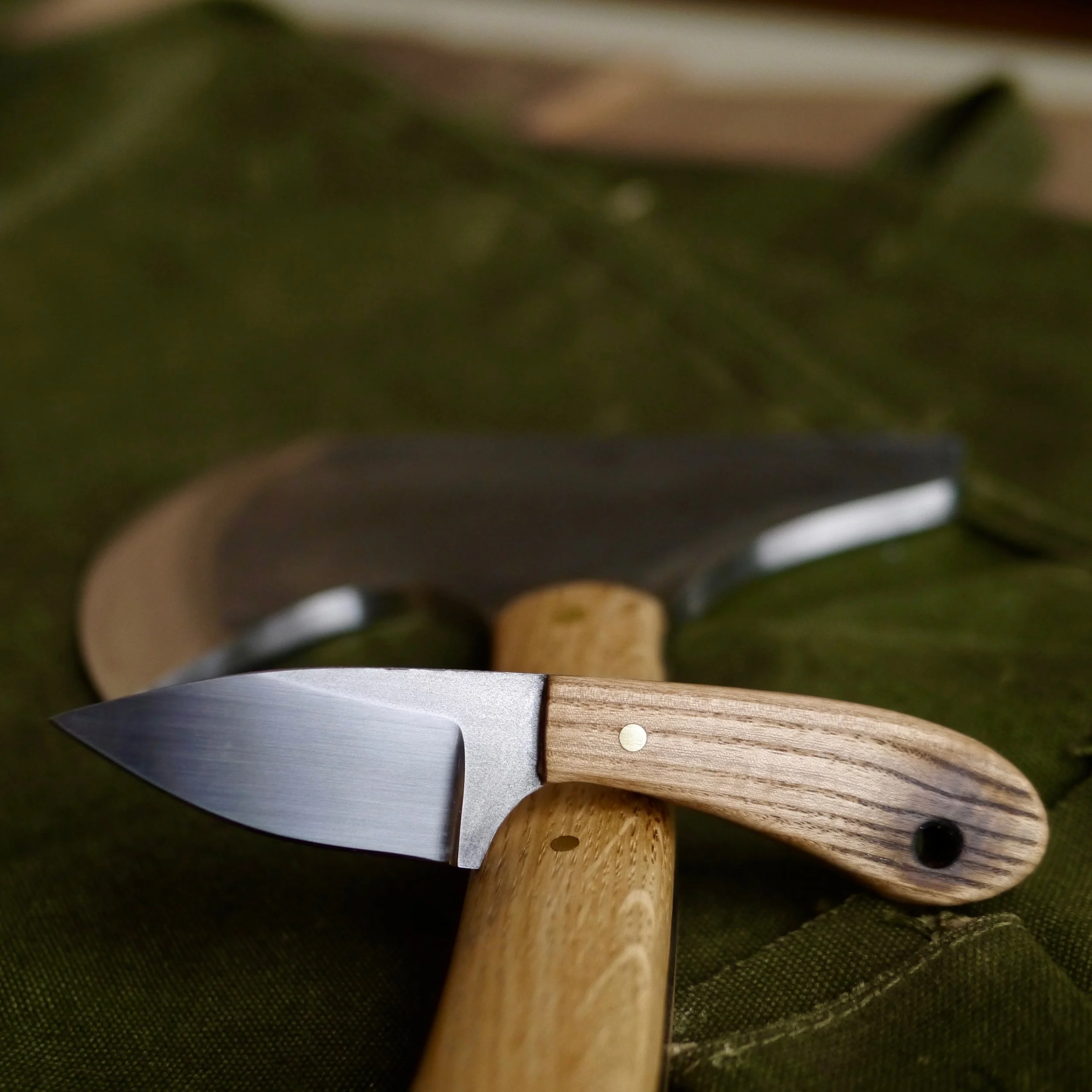Knife + Salvaged Harley-Davidson parts bin