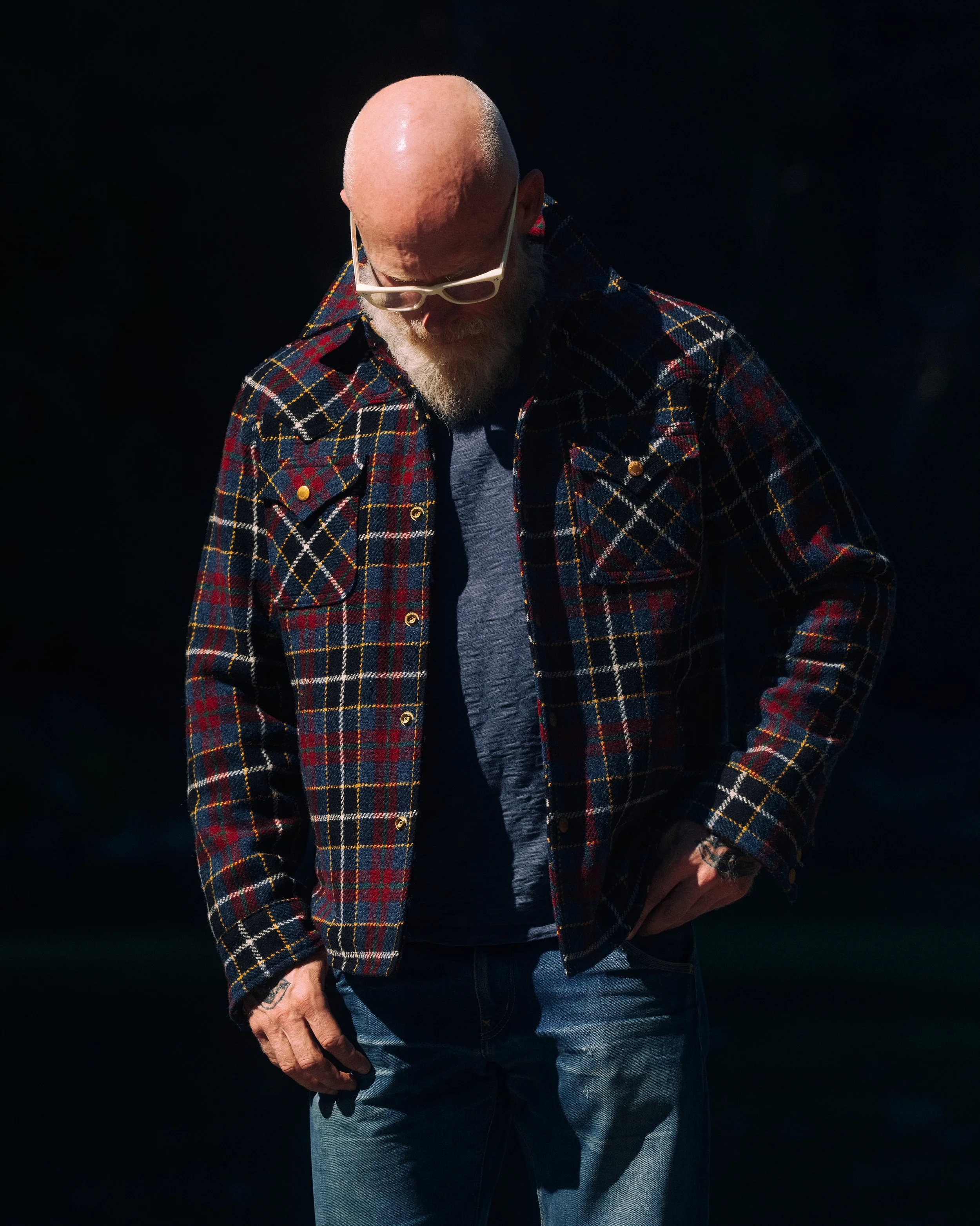 Black_Bear_Brand-midnight-glen-tartan-harristweed-western-jacket looking down.jpg