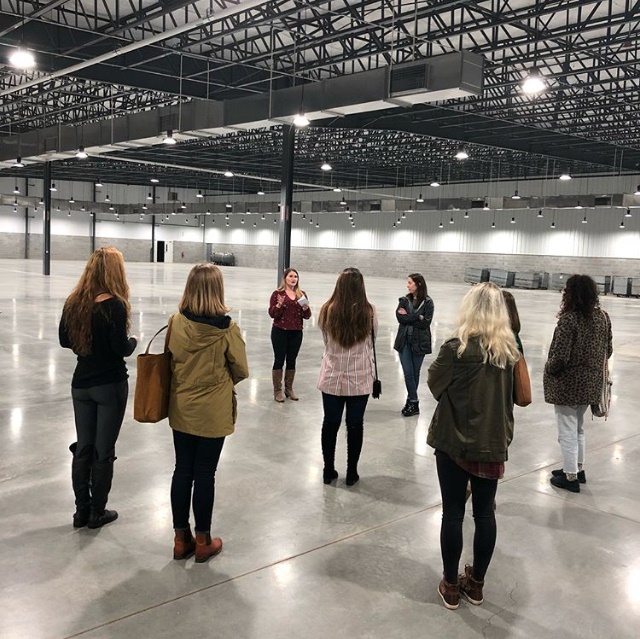 Jessica Dalton  leading her group through a tour of our new Plant 3!