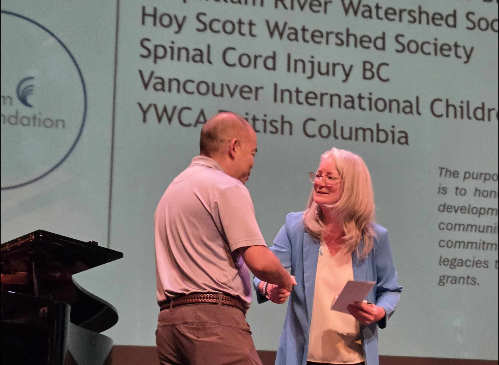 Kyle Uno accepts cheque for Society.png