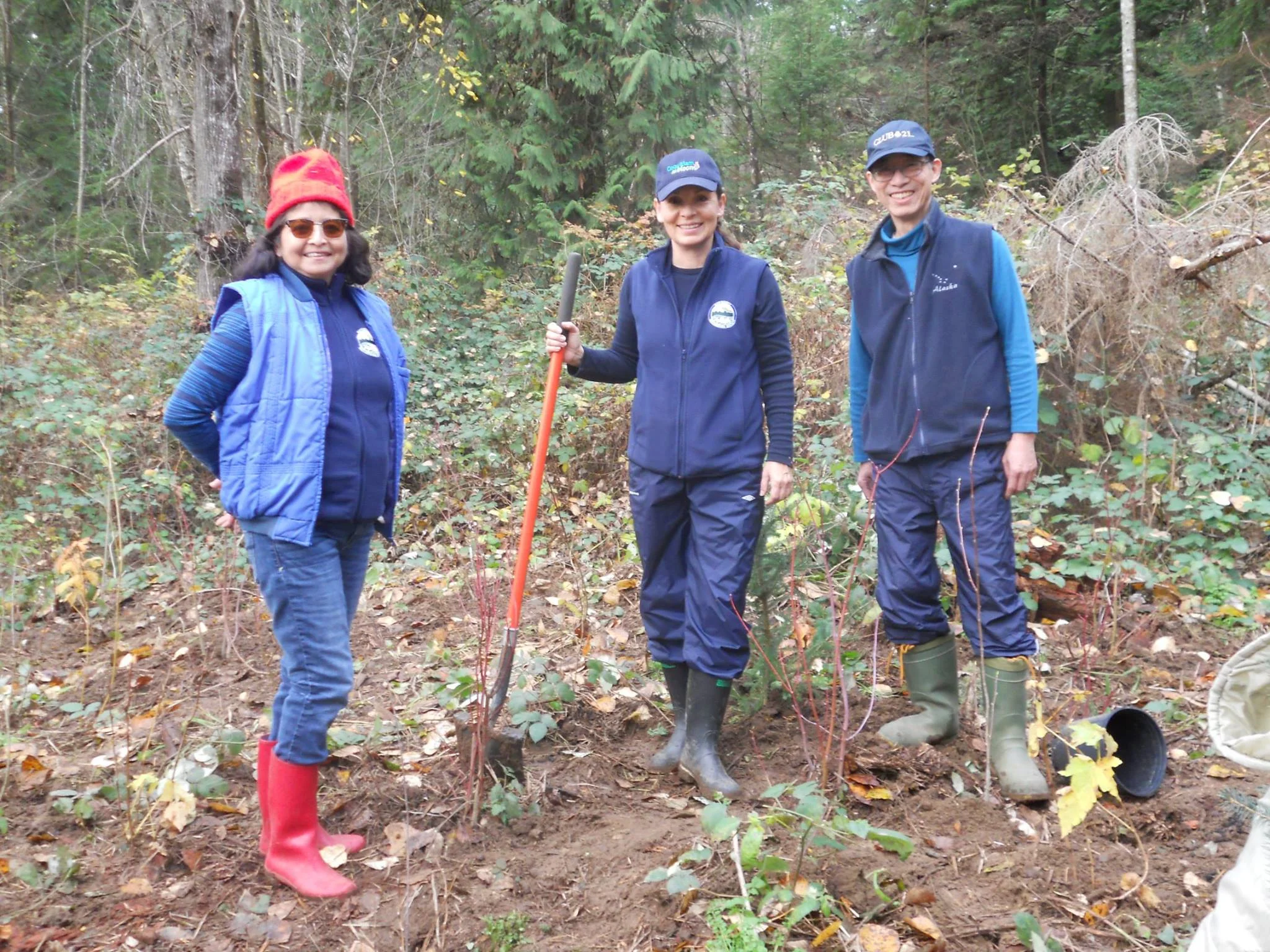 HSWS volunteers, Dulce, Robbin and Edmond in the planted area