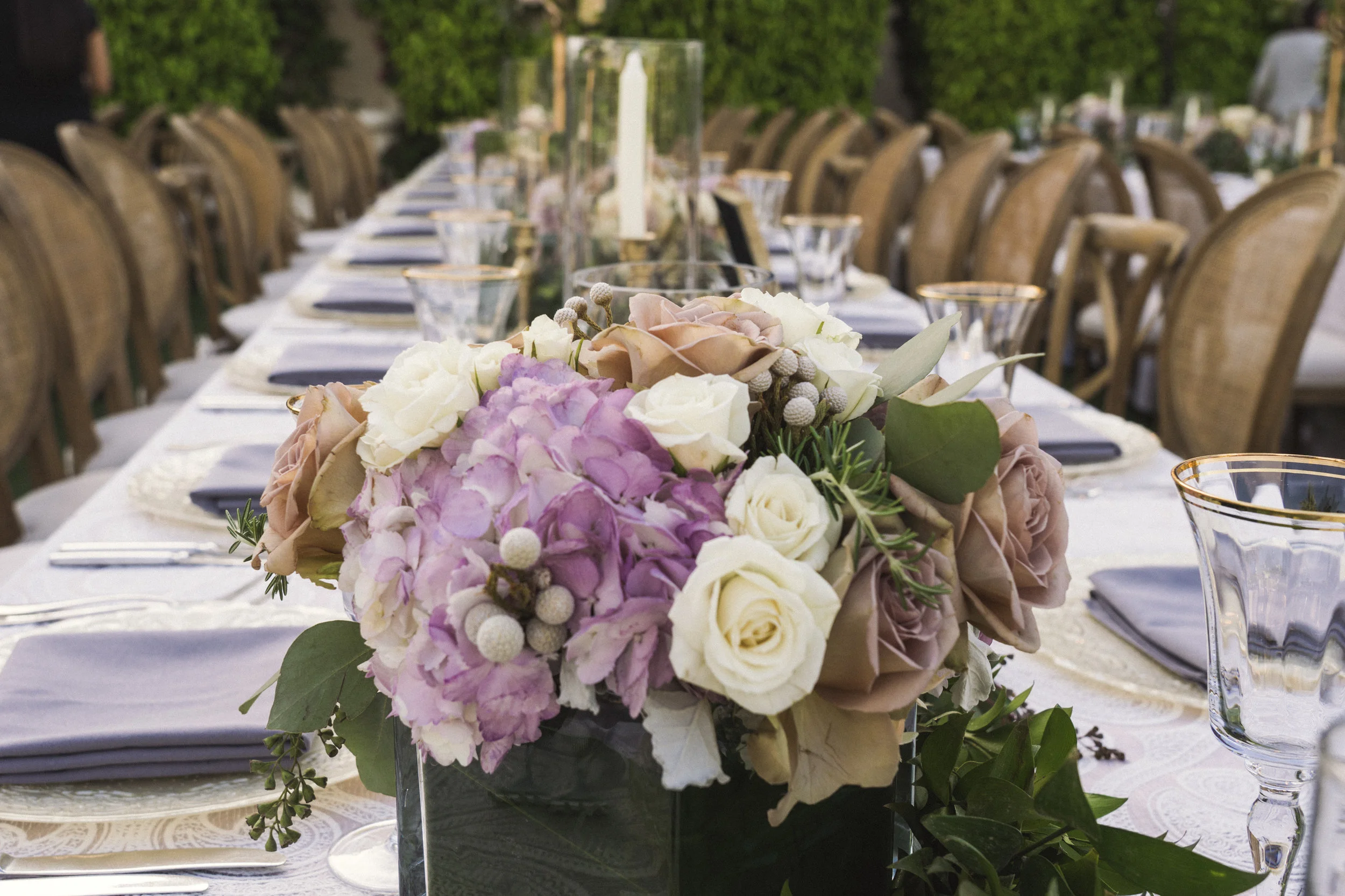 6 white rose purple hydrangea centerpiece candlelight dinner table Life Design Events photos by Keith and Melissa Photography.jpg
