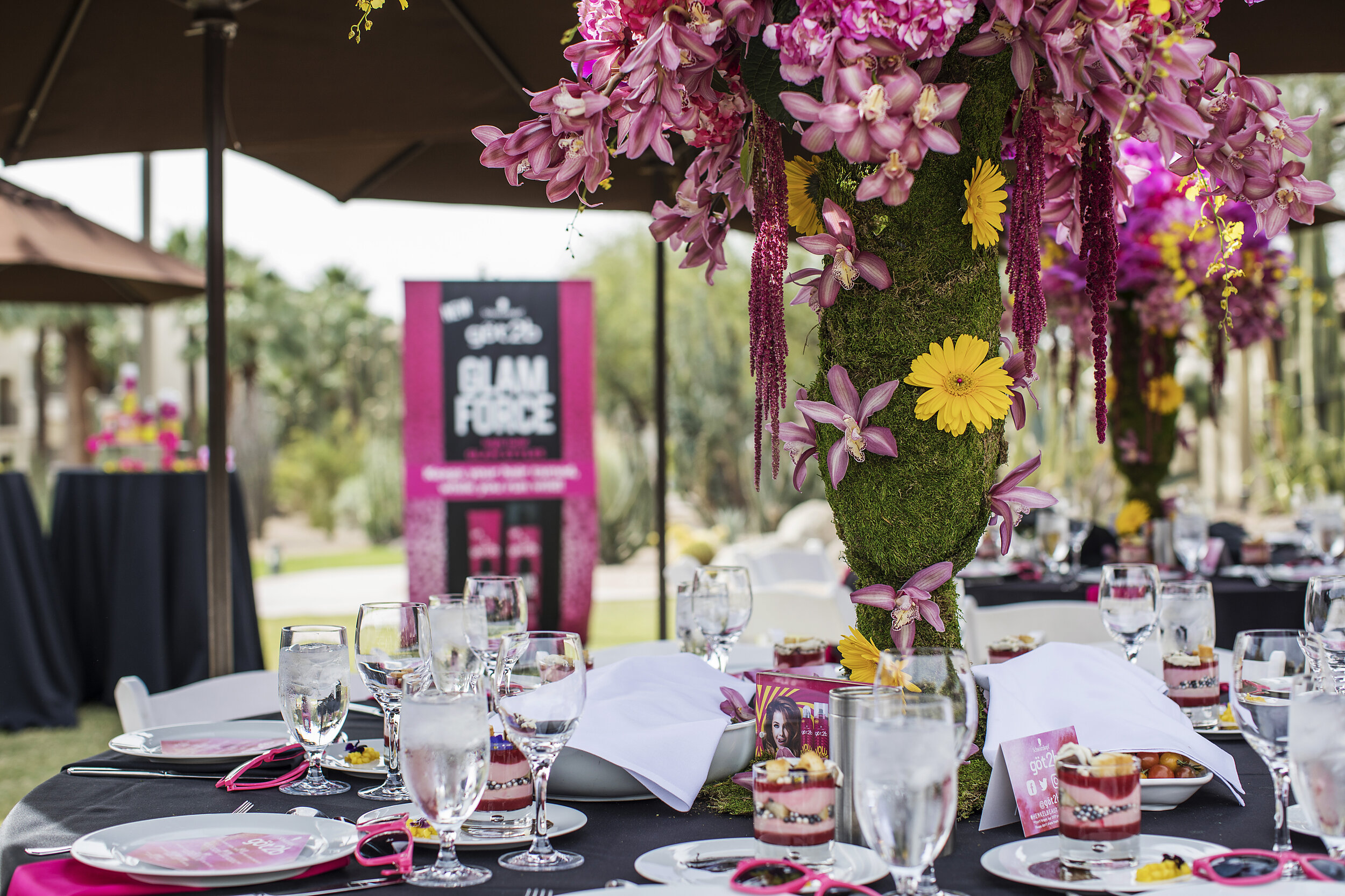 7 dramatic floral centerpiece pink yellow flowers orchid centerpiece outdoor lunch beauty product launch party Life Design Events photos by Largo Photography.jpg