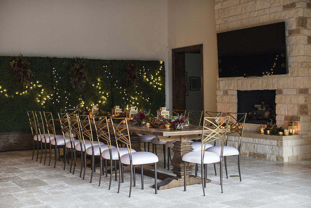 11 intimate dinner party christmas dinner party chameleon gold chair wood farm table white lights floral garland Life Design Events photos by Largo Photography.jpg