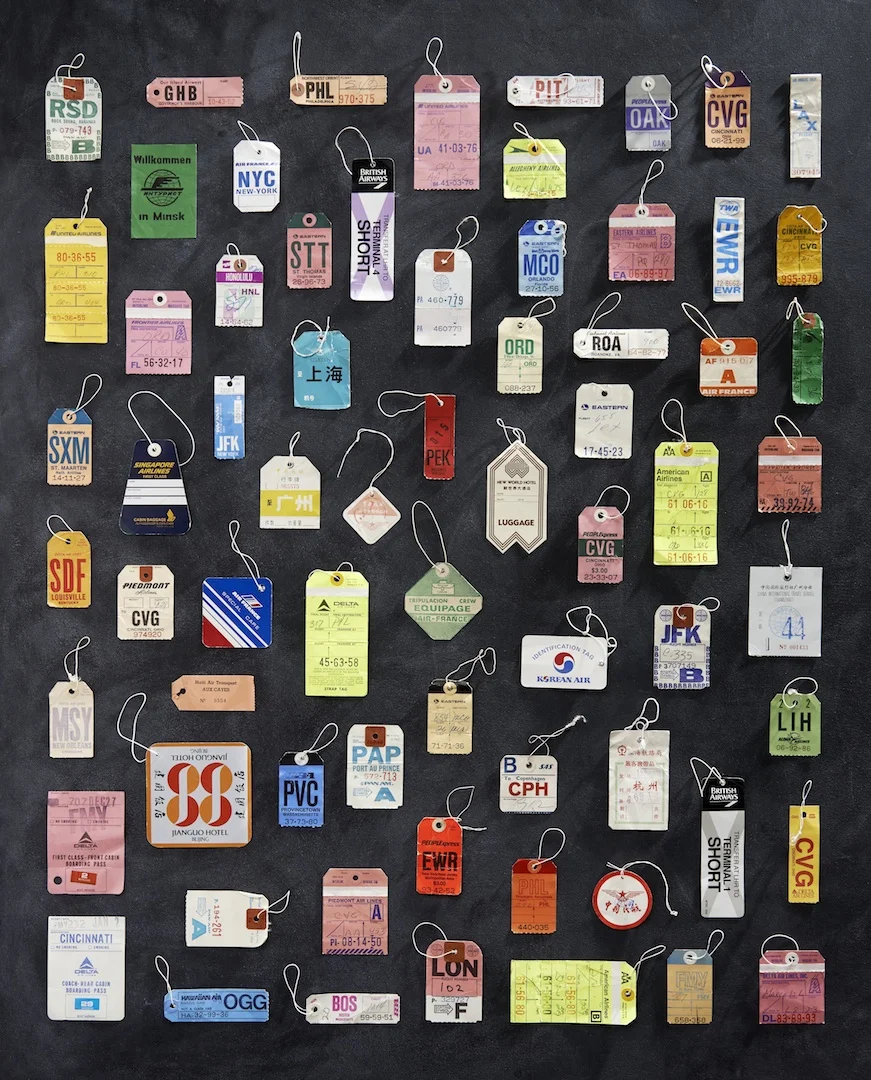 VINTAGE_LUGGAGE_TAGS_ON_BLACKBOARD+copy.jpg
