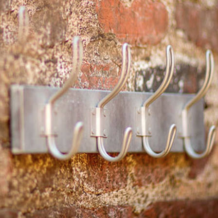 Using hooks for towels is an excellent way to show off your towels while adding personality.