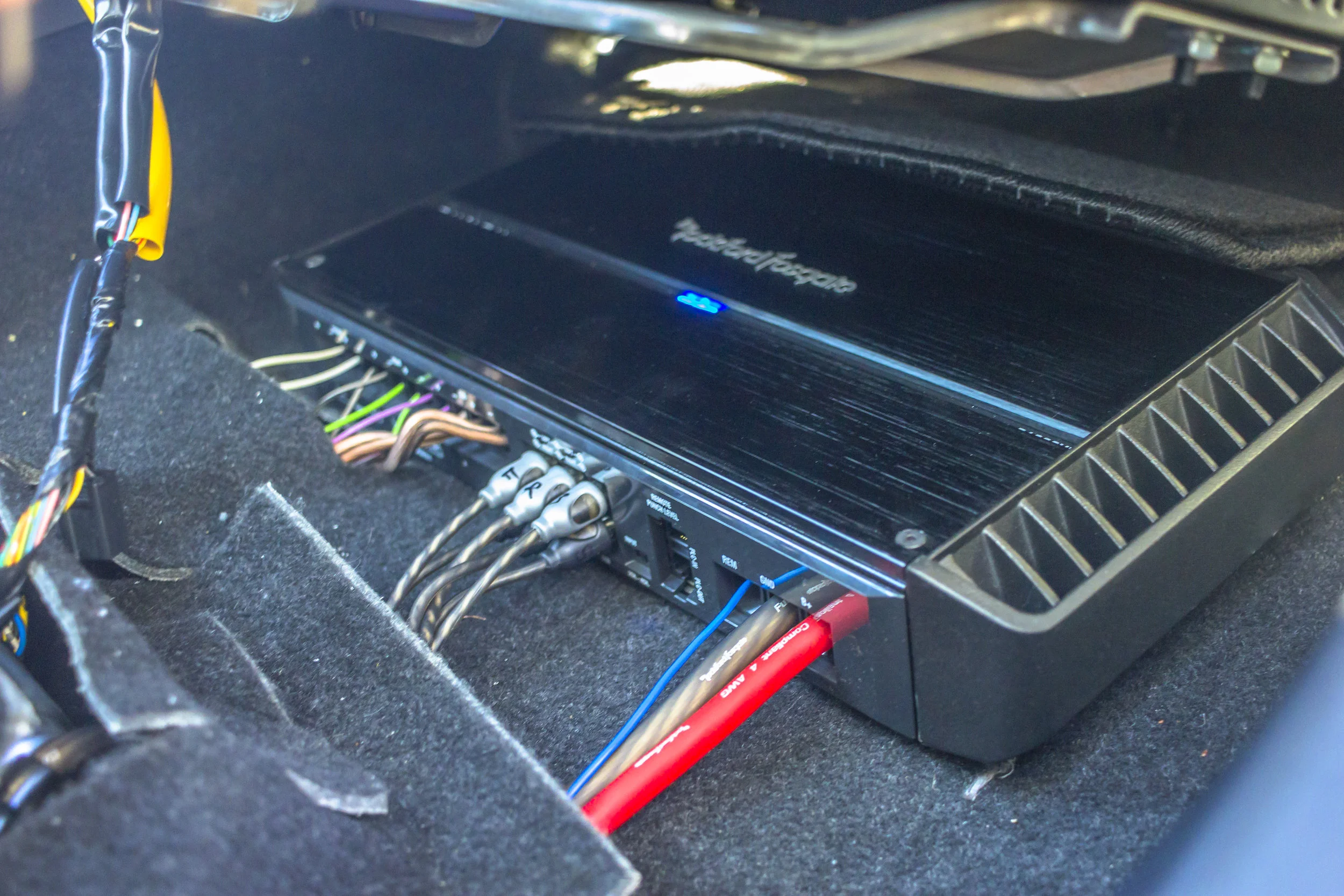 mitsubishi lancer factory subwoofer