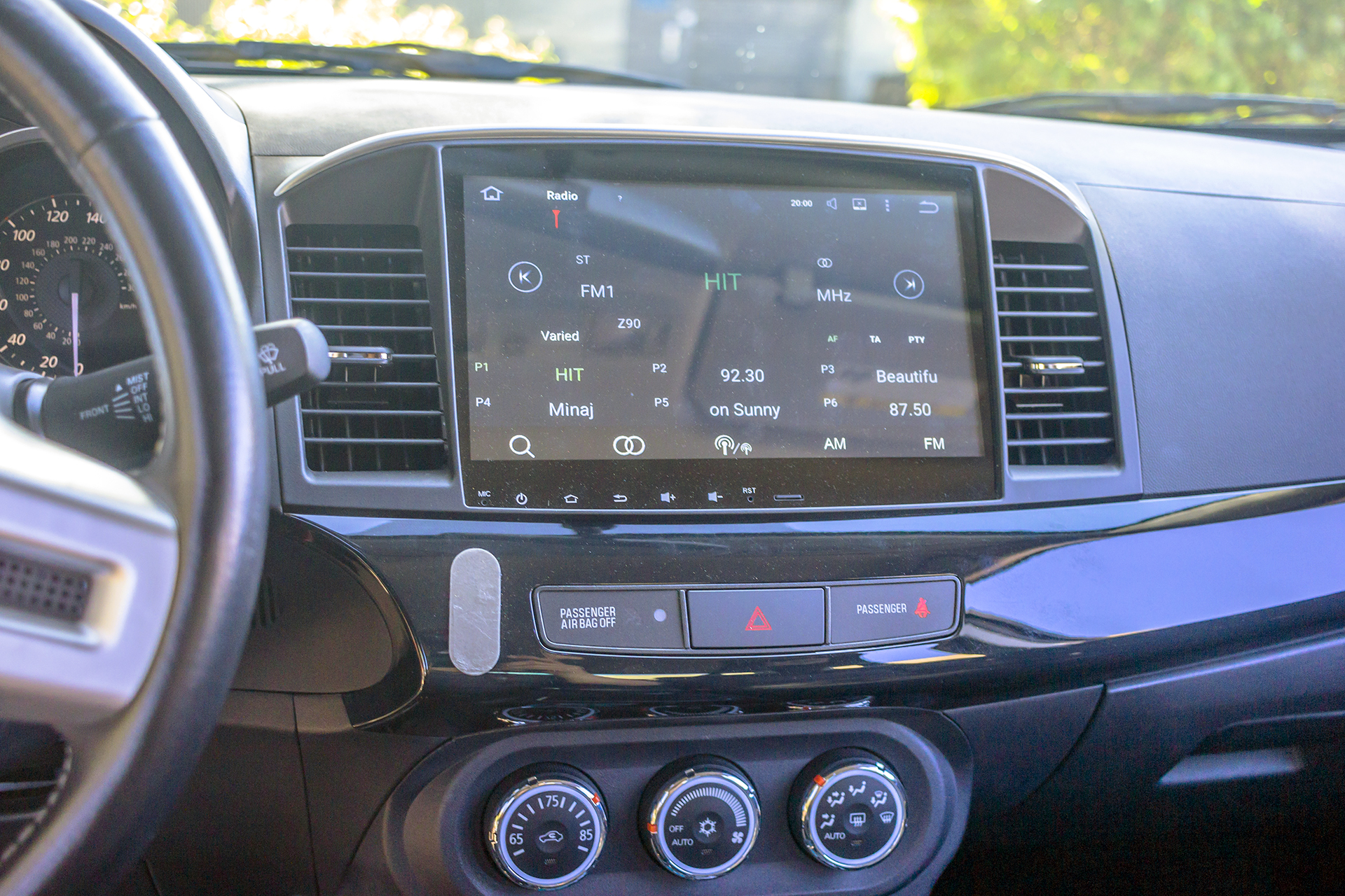 2013 Mitsubishi Lancer Evolution Aftermarket Radio.jpg