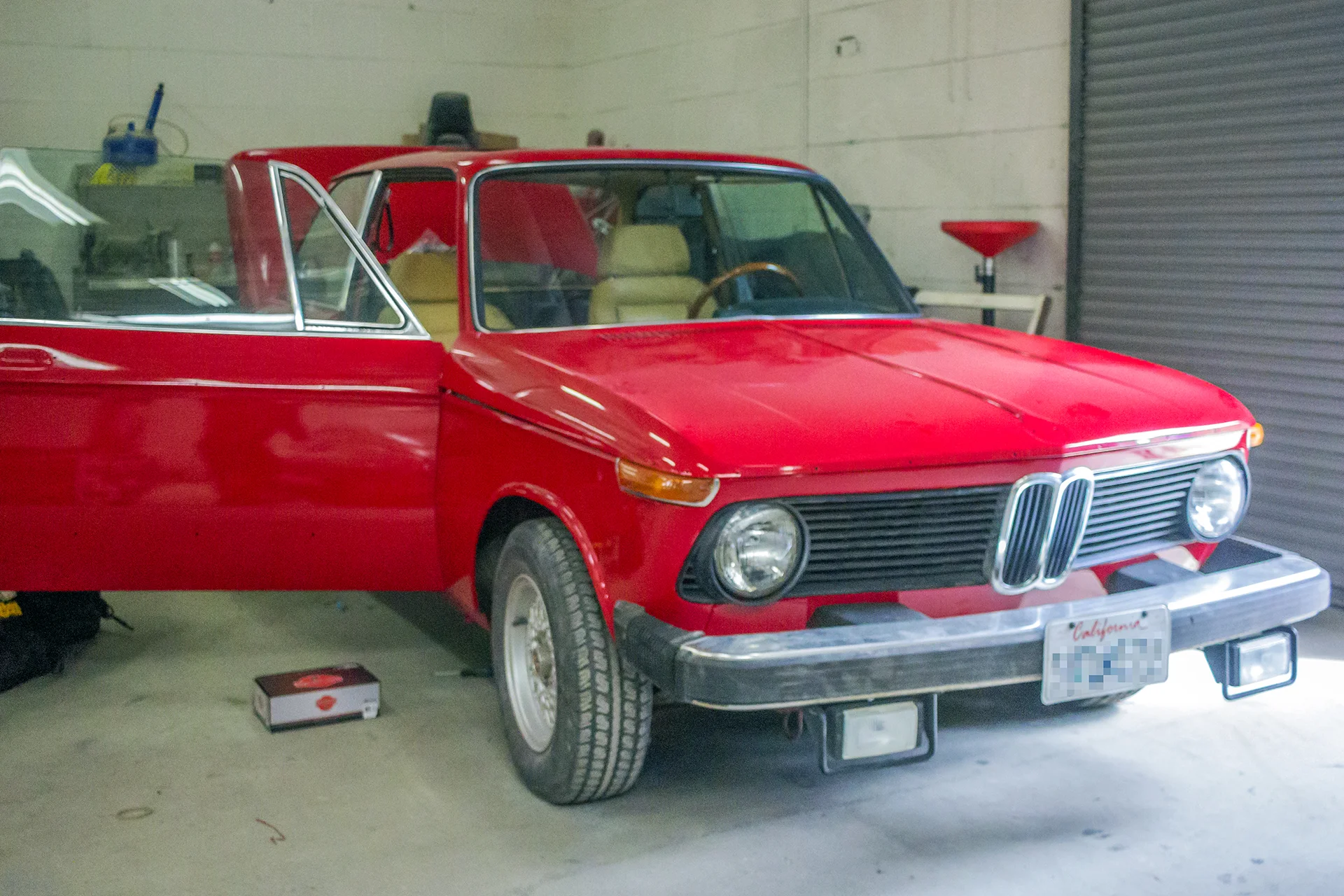 This 1976 BMW 2002 has us install a new radio from RetroSound!