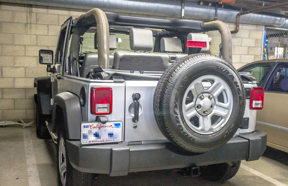 Added some new functionality and better sound to this 2009 Jeep Wrangler! —  Twelve Volt Technologies
