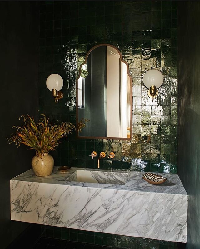 Inspired by this moody and luxe powder room by @discinteriors in their ground up LA project.

#interiors #disc #powderroom #design #style #zellige #tile #marble #vanity #sink #powderroomdesign #brass #faucet #monolithic #stone #la #contemporaryinteri