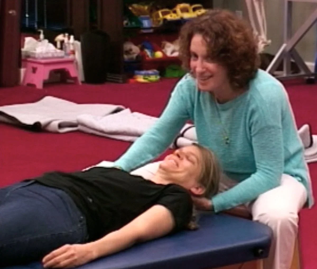 Anat Baniel working with Birgit Jung-Schmitt during a demonstration at her professional training.