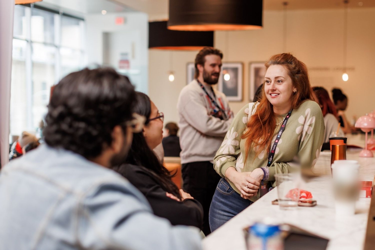 Kiley at a design leadership event, speaking with attendees