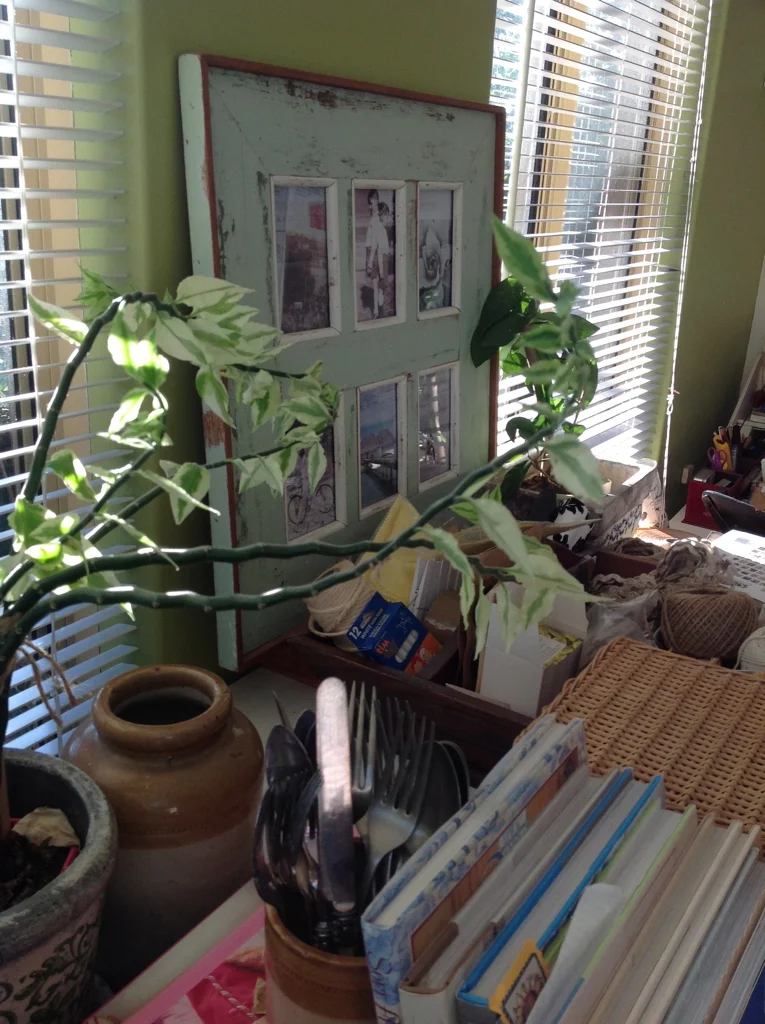 Antique Cutlery amidst plants & books my Studio work bench