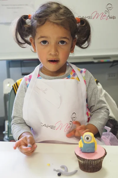 One of the youngest of the kids having a great time sugar sculpting