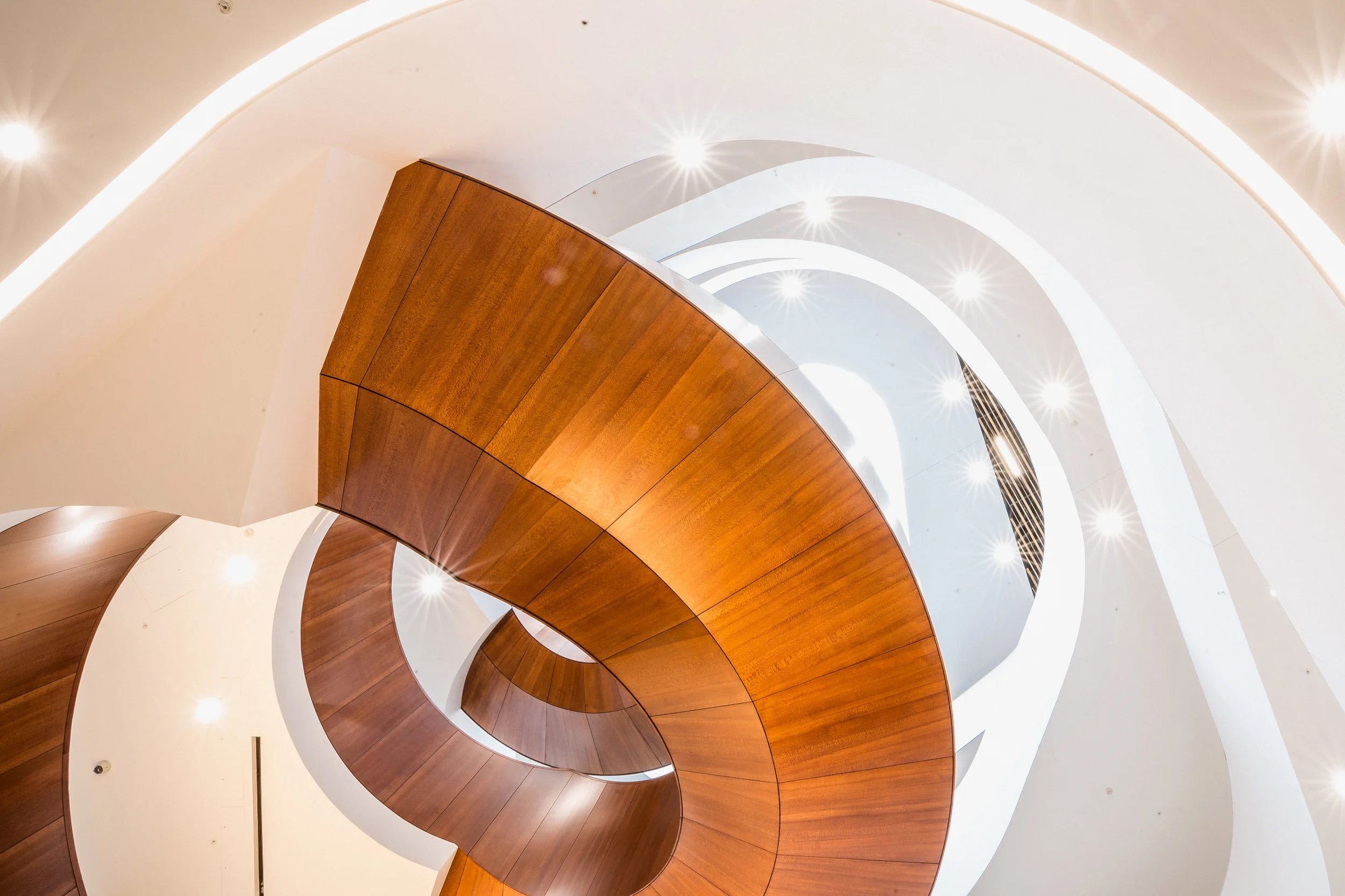 Looking up at central staircase in the Abercrombie Building. 