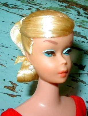 After! Platinum Blond Swirl with hair and paint restorations