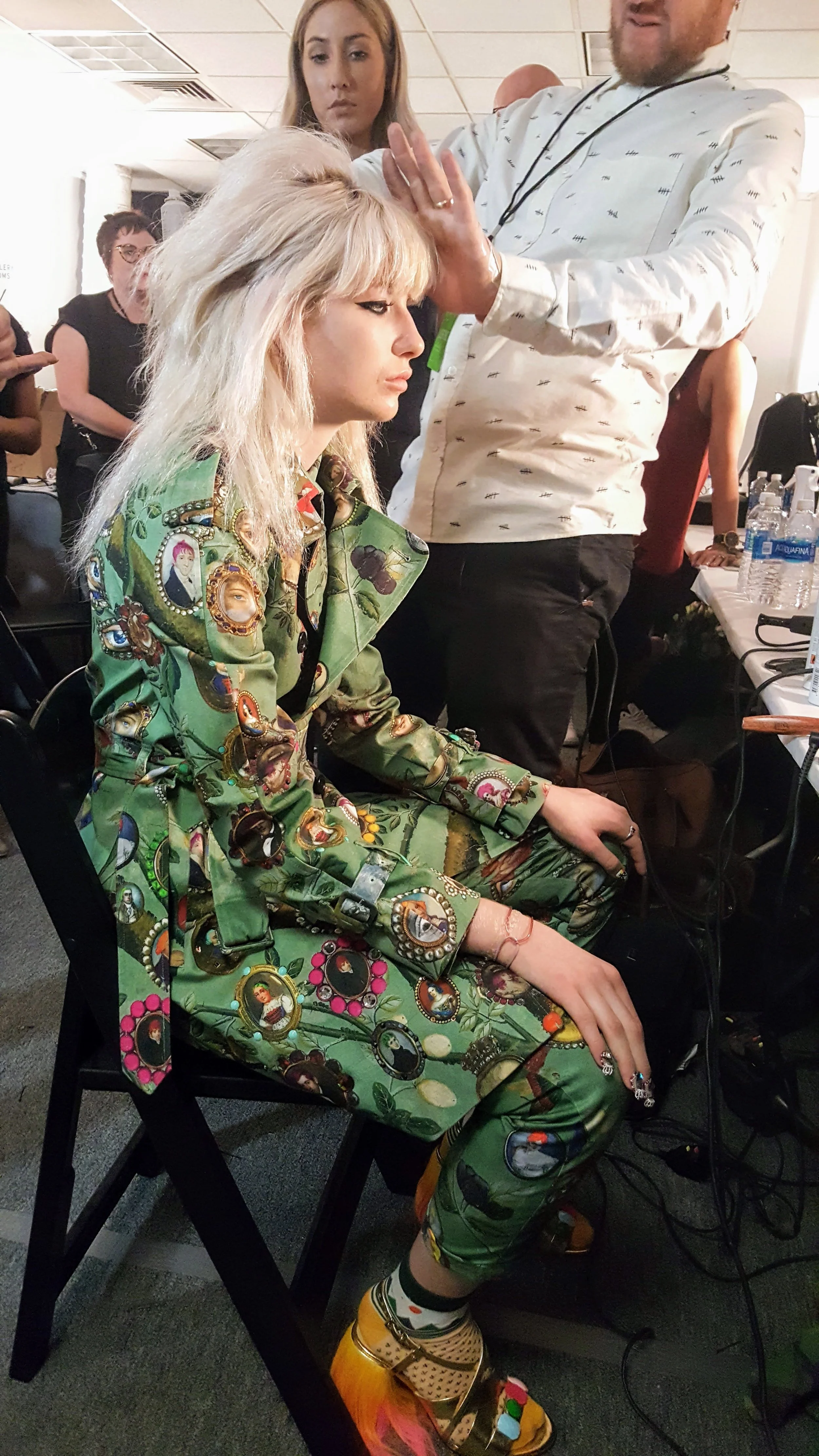 Last minute prep - as you can see by now, the hair was very messy, with a grunge look. My favorite aspect of this look is tough for me to articulate, but the suit is especially great as a juxtaposition of whimsical pattern with structural tailoring of the suit itself, although, I love those fluffy rainbow, pom-pom sandals.