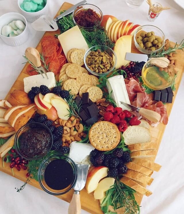 How was your New Year's Eve? What did you do to celebrate?

We had a lot key party. My favorite part of preparing for a party is making the food and planning out the menu.

My all time favorite thing is to make cheese and crudit&eacute;s boards. They