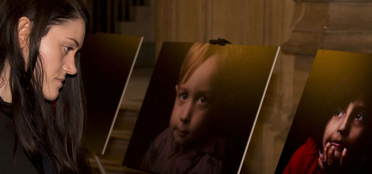 Guest looking at the Rare Project exhibition on display in the House of Parliament