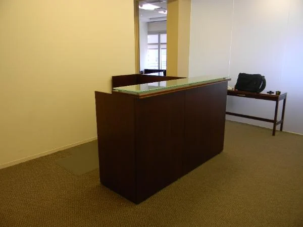 N5 - Reception desk with smoke glass transaction counter. 6'x 6' with BBF and 2dr lateral file.  Very nice.