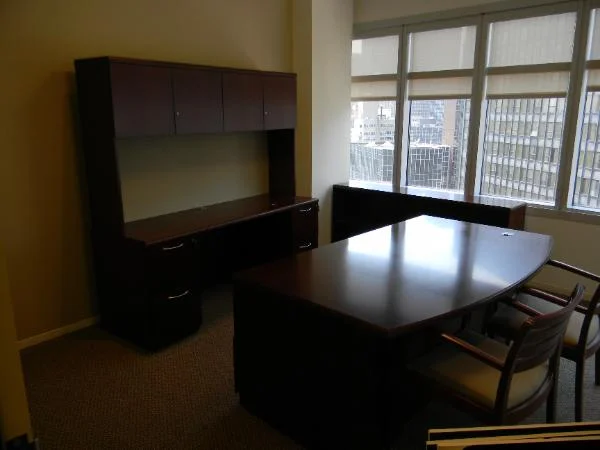 N6 - Bow Front wood desk 72" X 36/42" with 24" x 72" credenza / hutch and 72" low bookcase.