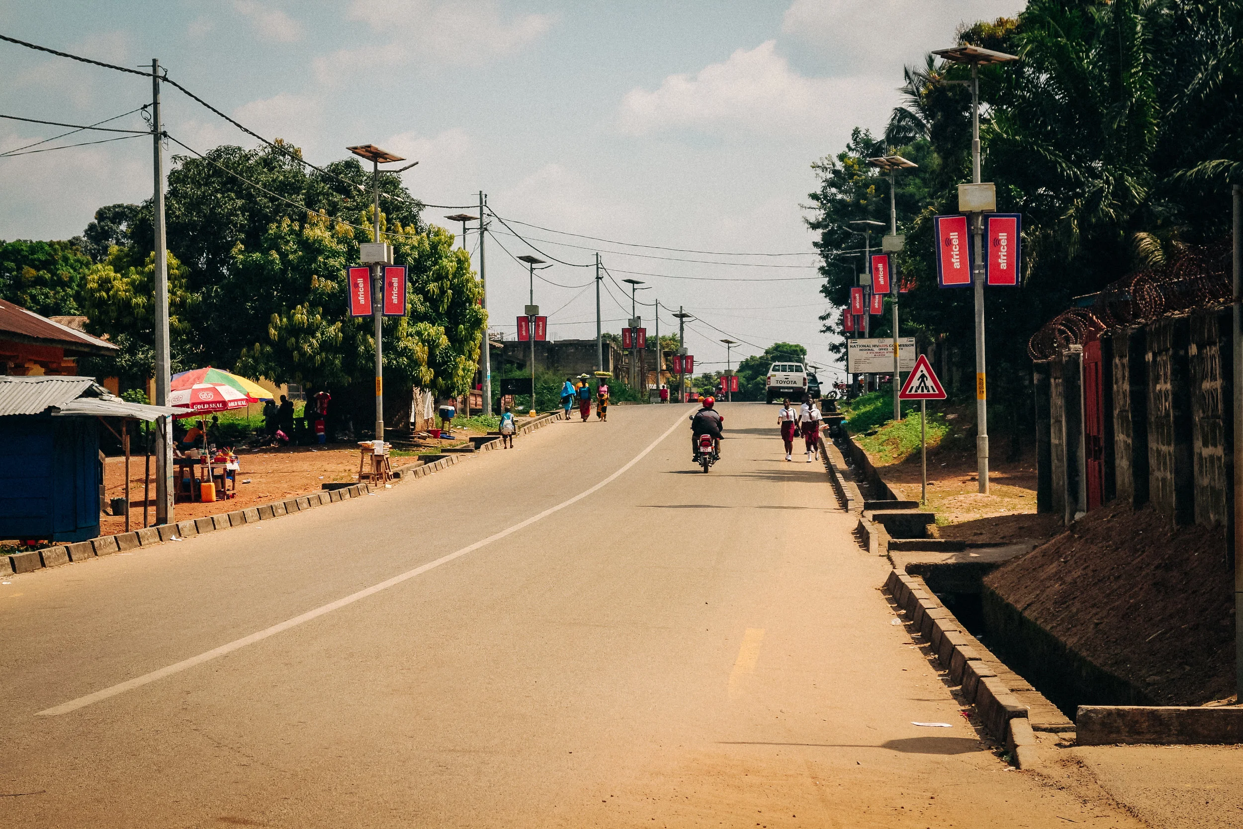 … to the tarmacked streets of Makeni.