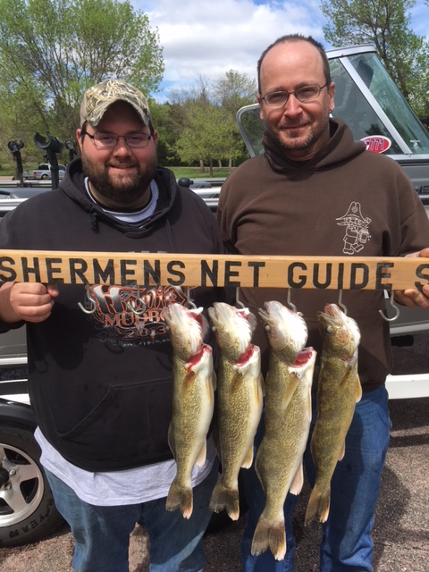 Real tough day! Air temperature dropped to 43 degrees and the wind blew 30 plus mph. Nick and Tyler also caught 11 northerns that they threw back. Smallest walleye was 18 1/2”. Nice fish.